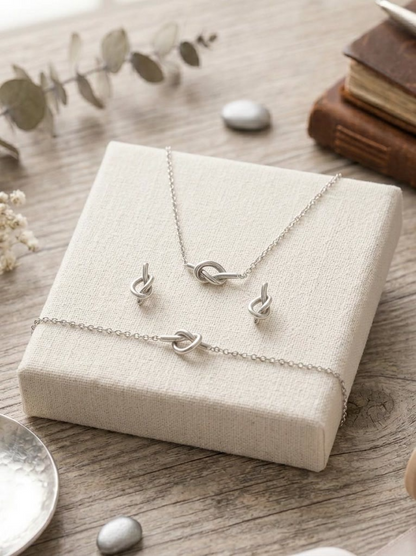 Elegant Silver Love Knot Jewelry Set – Minimalist Necklace, Bracelet & Earrings
